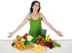 woman standing near table full of vegetables