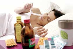 sick woman with medicines