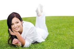 happy woman on green grass