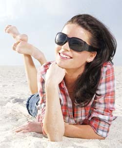 second woman smiling even in the sun