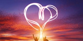 Colourful graphic depicting celebration of love with couple leaping towards heart symbol