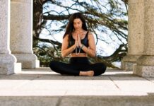 Woman practicing morning chants and mantras