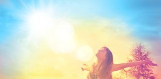 woman feeling blissful as she surrenders