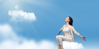 Woman sitting on cloud