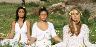 Three girls doing meditation