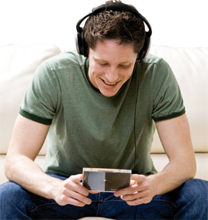 Man listening to music on his headphone