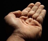 Supressing feelings of compassion costs us Outstretched hand