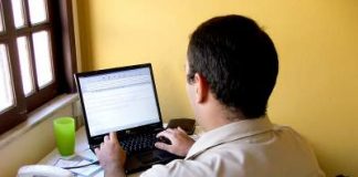 Take an email vacation Man writing email