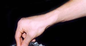 putting out a cigarette