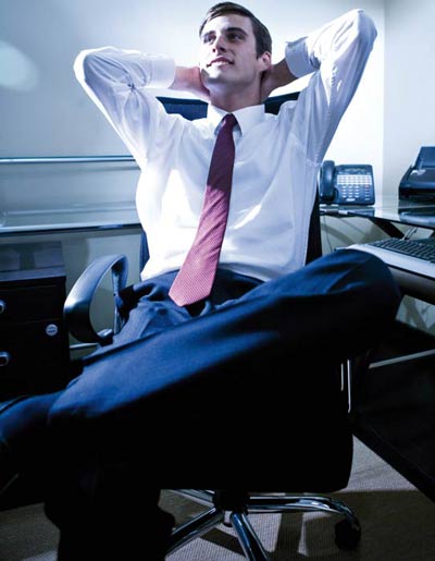 Mindfulness in practice: Man relaxing in the office