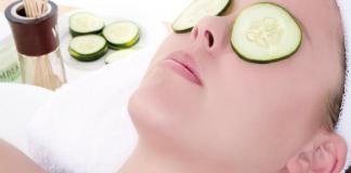 Everyday eye care Woman placed cucumber for eye care