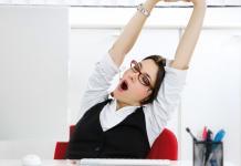 Woman stretching at work
