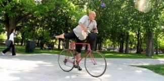 Exercise makes you sharper and fitter Old man getting off a bicyle
