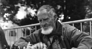 Old man playing chess