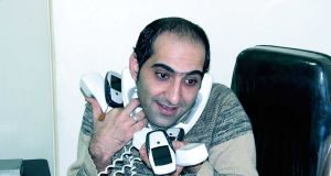Man talking on many phones