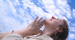 Hand of God woman praying