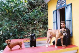 Wendell Rodricks with his pet dogs: A blue eyed Harlequin Great Dane called Zeus, a fiesty boxer Sophia and an adorable daschund christened Tyra