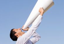 Man shouting with a megaphone