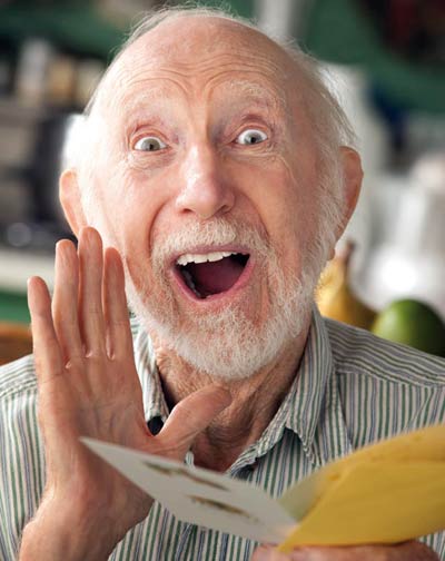 Man surprised in receiving a greeting card