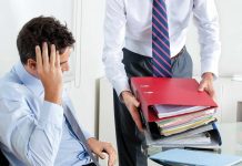 How to un-trap yourself from difficult work situations man tired, many files office