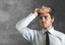 Do you wear a mask at work? Man removing his mask
