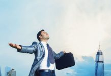 The effortless way to work-life balance man in business suit with arms outstretched, work-life balance