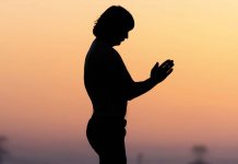 The secret to happiness is surprisingly simple Man kneeling down and praying