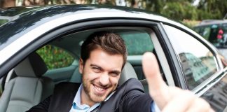 Practicing mindfulness while driving Happy man driving | Concept for mindfulness while driving