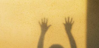 The Real Source of Fear (And How to Face It) Little girl hands shadow / fear concept