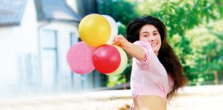 Happy woman with baloon; freedom