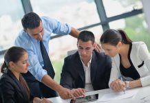 There Is More to Good Leadership That Just Being a Great Motivator Group of happy young business people in a meeting at office