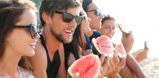 Feeling stuck in life? Check the company you keep Friends eating watermelon slices outdoor / influence