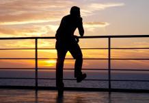 Thinking man silhouette and red sunset, contemplate