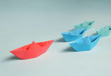 Origami boats / Concept of being competitive