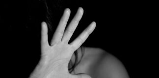 New understanding of brain’s fear response hand covering face — fear response