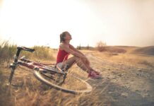 young woman practising conscious breathing outdoors