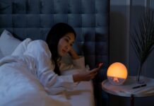Woman awake at night — circadian rhythm disorder concept