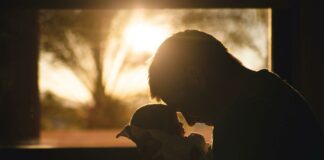 New dads experience changes in their brains Father and newborn | New dads concept