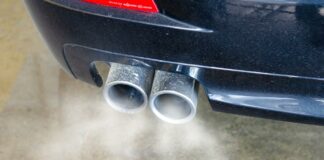 Car exhaust | traffic pollution concept
