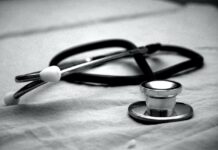 How to Become a Better Nurse Practitioner A stethoscope black and white close up