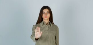 Woman gesturing stop | Concept of setting boundaries