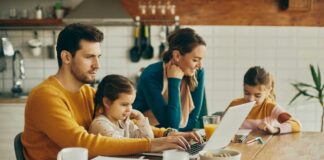 Busy parents with kids juggling with work | time management concept