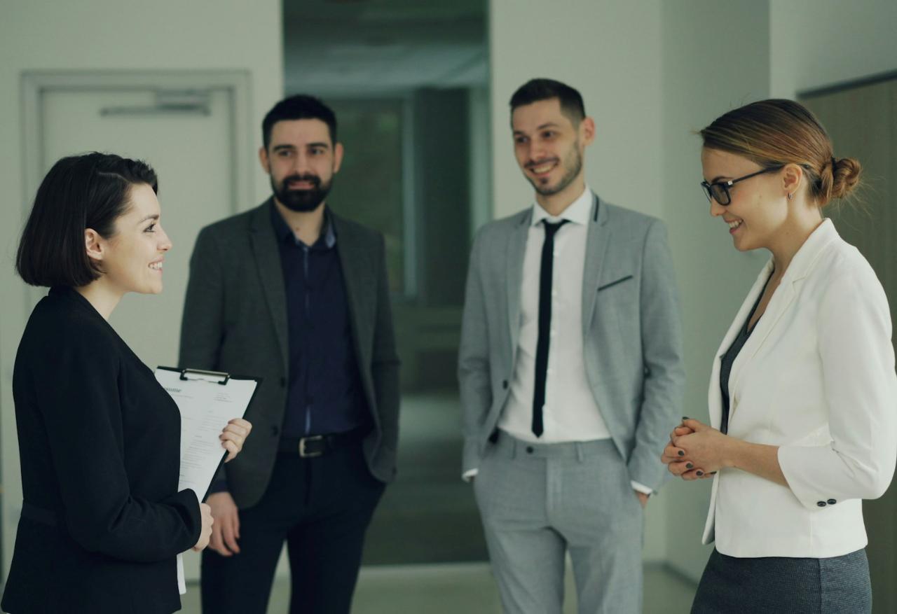 Executives having a friendly conversation at work