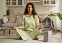 Woman meditating and chanting mantras